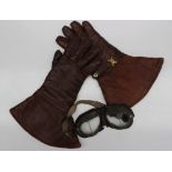 A pair of Turners Oakleaf gauntlet brown leather gloves together with a pair of goggles