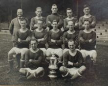 A black and white team photograph depicting the "English Cup Winners 1926-27",