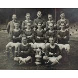 A black and white team photograph depicting the "English Cup Winners 1926-27",