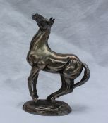 A John Pinches limited edition British Horse Society silver horse sculpture "Playing Up",
