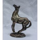 A John Pinches limited edition British Horse Society silver horse sculpture "Playing Up",
