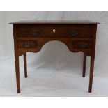 A 19th century oak lowboy,