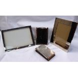 A George V silver photograph frame, Birmingham, 1921, together with another silver photograph frame,