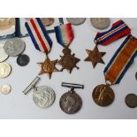 A set of three World War I medals including the 1914-15 star,