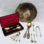 A George V silver salver, with a shell and leaf border, on three paw feet, Sheffield, 1927,