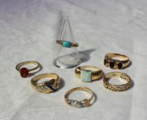 A 14ct gold turquoise set dress ring together with six other 14ct gold dress rings