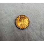 A Victorian gold sovereign dated 1896,