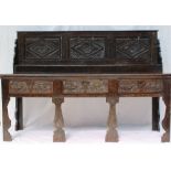 A 19th century carved oak dresser,