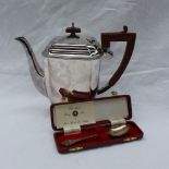 A George VI silver hot water pot,