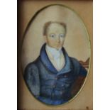 19th century British School Head and shoulders portrait of a gentleman in a blue frock coat An oval