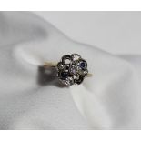 A diamond and sapphire cluster ring,