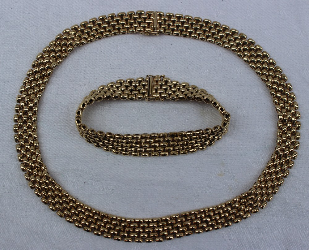 A yellow gold necklace and matching bracelet, with five rows of oval links, - Image 3 of 3