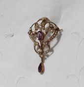 An Edwardian amethyst and seed pearl brooch/pendant,