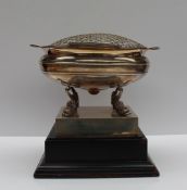 A George VI silver rose bowl, of circular lobed form on dolphin feet and a square base, Sheffield,