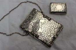 An Edward VII silver carrying card case decorated with flowerheads, Sheffield, 1902, Walker & Hall,