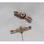 A Victorian 9ct yellow gold bar brooch, the central star set with seed pearls,