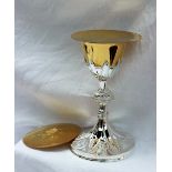 A French white metal and gilt decorated chalice, Minerva mark,