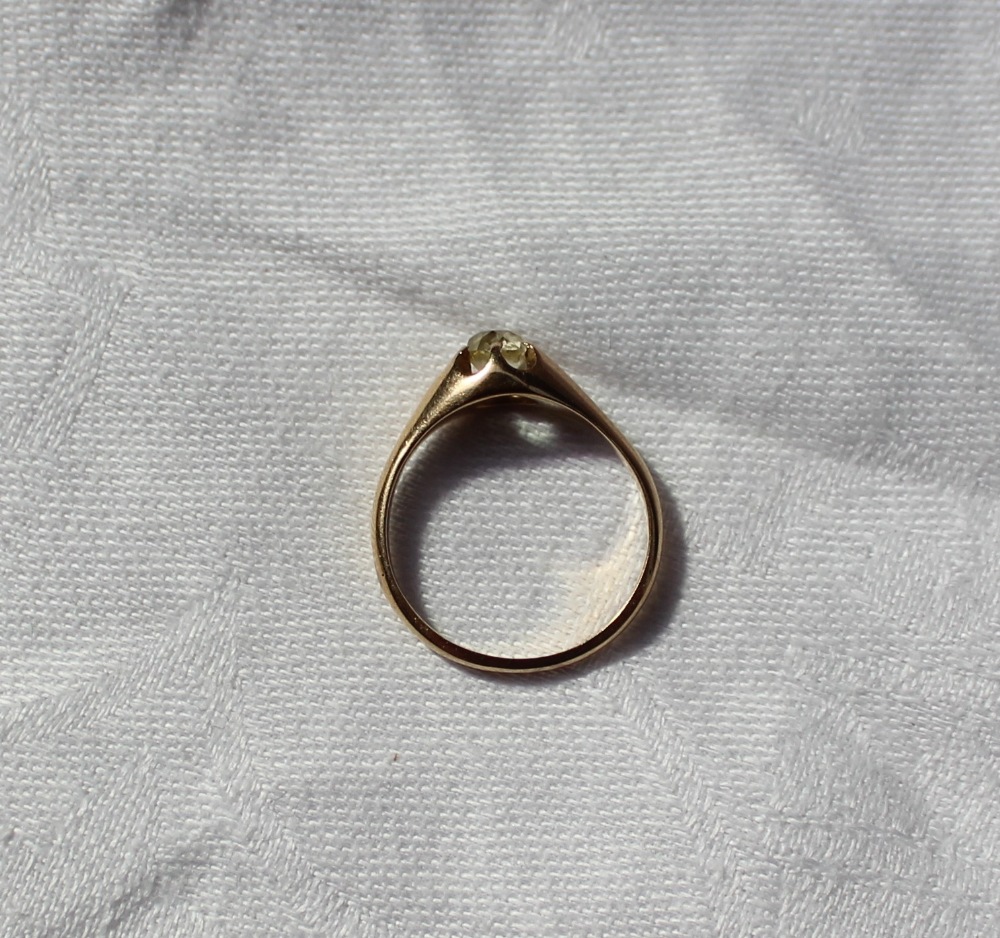 A diamond set signet ring the oval stone claw set in yellow metal to a yellow metal shank - Image 2 of 3