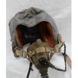 An RAF blue cloth flying helmet with leather integral headphones, mask etc,