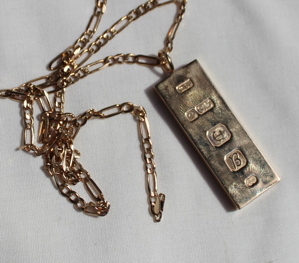 A 9ct yellow gold ingot, on a yellow metal chain marked 9ct, - Image 2 of 2