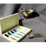 A boxed set of David Andersen enamel and gilt decorated coffee spoons, marked 925S Norway Sterling,