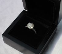 A solitaire diamond ring, the round brilliant cut diamond approximately 3 carats,