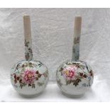 A pair of Chinese porcelain bottle vases painted with birds, flowers and leaves,