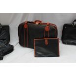 A Serapian Italian suitcase, together with a matching document case, and Serapian bags etc.