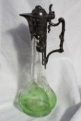 An Art Nouveau WMF electroplated and engraved green glass claret jug,