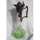 An Art Nouveau WMF electroplated and engraved green glass claret jug,