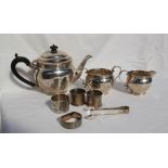 A George V silver three piece silver teaset, London, 1925 together with silver napkin rings,