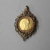 A Victorian gold half sovereign dated 1894 in a 9ct gold pendant slip mount,