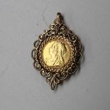 A Victorian gold half sovereign dated 1894 in a 9ct gold pendant slip mount,