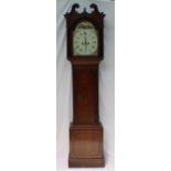 A 19th century oak longcase clock, the hood with a broken swan neck pediment and fluted columns,