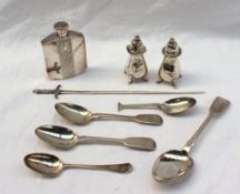 A pair of George VI silver pepperettes, of baluster form with a pierced domed top on four feet,