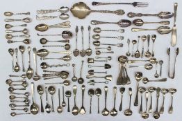 A large quantity of silver spoons, including tea spoons, mustard spoons,