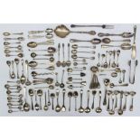 A large quantity of silver spoons, including tea spoons, mustard spoons,