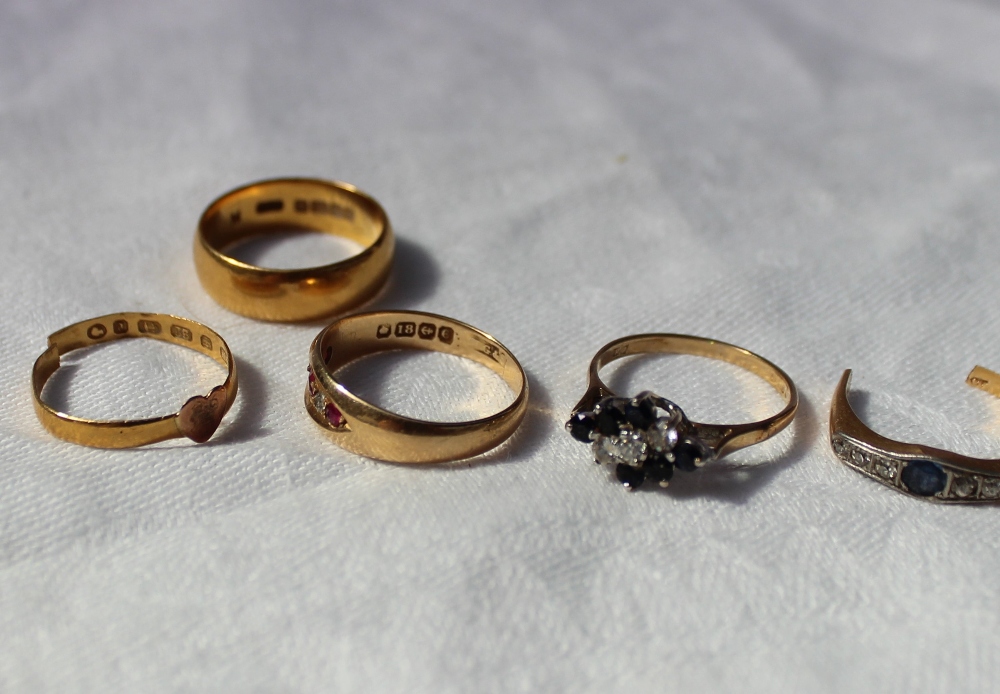 A 22ct yellow gold wedding band together with another 22ct gold ring, approximately 7 grams, - Image 2 of 2