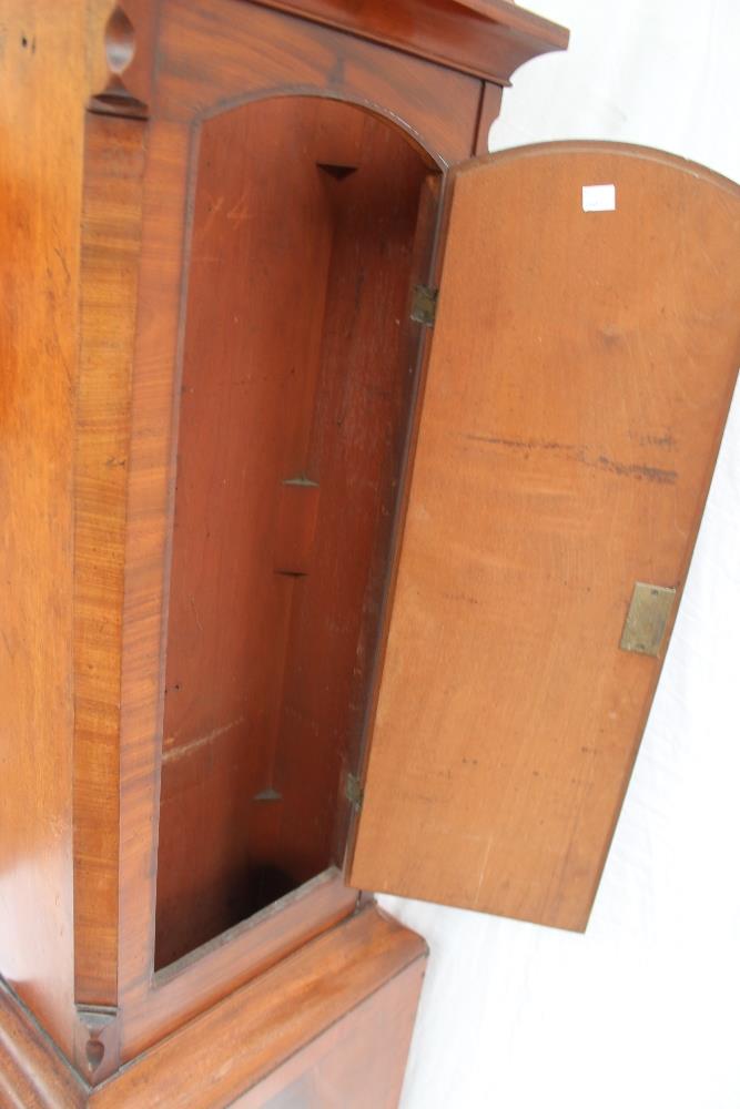 A 19th century mahogany longcase clock, the arched hood above a long trunk door, - Image 7 of 7