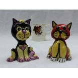 Two Lorna Bailey models of cats together with a mug