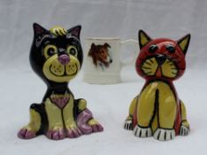 Two Lorna Bailey models of cats together with a mug