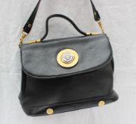A Gianni Versace black leather handbag with gilt metal mounts CONDITION REPORT: In
