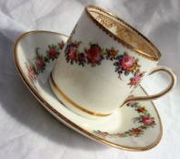 A Nantgarw porcelain coffee can and saucer, with a scalloped gilt rim,