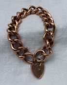 A 9ct yellow gold bracelet, with hollow twisted oval links on a padlock clasp,