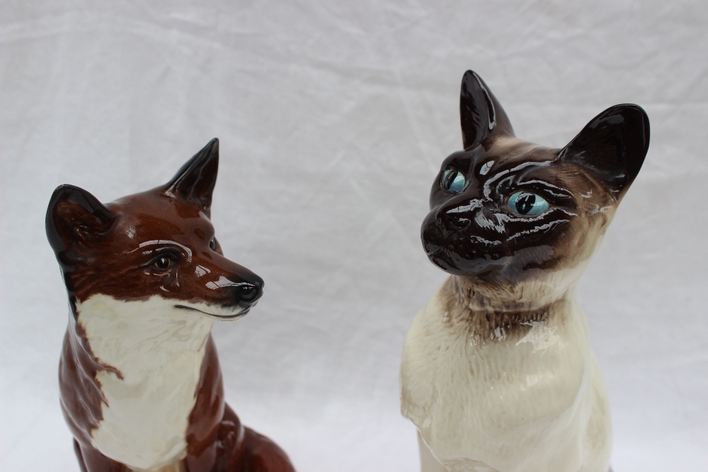 A Beswick model of a seated fireside fox No. 2348, 31. - Bild 2 aus 5