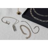 A 9ct gold necklace with a hardstone revolving fob, together with a 9ct white gold bracelet,