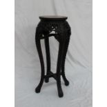 A Chinese hardwood and marble inset jardiniere stand,