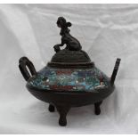 A Chinese bronze and champleve enamel twin handled Koro, with a dog of foo with paw on a ball,