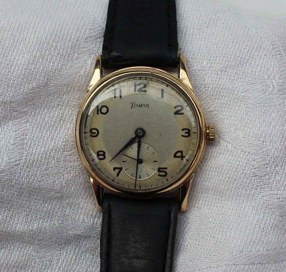 A gentleman's 9ct yellow gold Timor wristwatch,