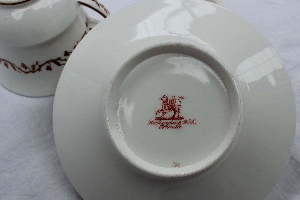 A trio of Rockingham porcelain breakfast cup, teacup and saucer, - Image 4 of 4